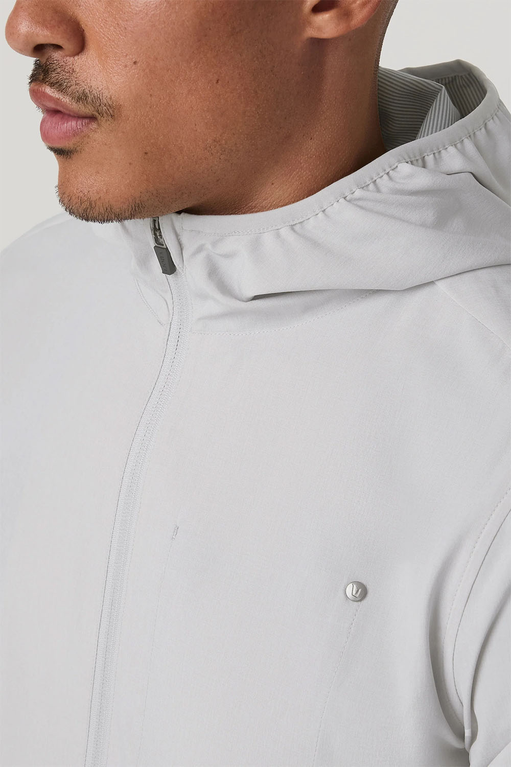 vuori outdoor trainer shell grey mist linen texture detail