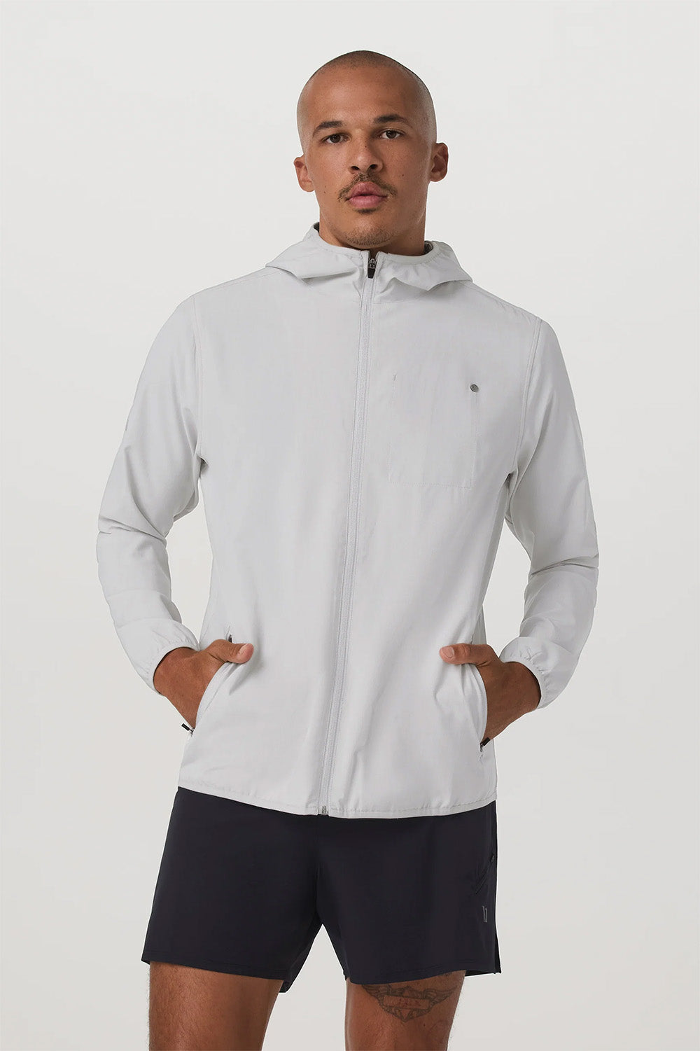 vuori outdoor trainer shell grey mist linen texture front